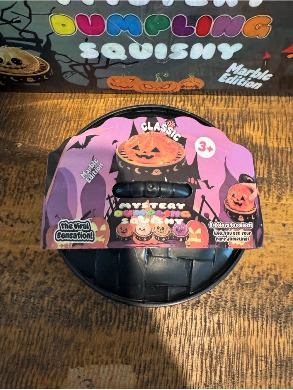 Halloween Pumpkin Dumpling Glitter Squishy w/ Storage Case - Orange Sensory Toy - Picture 8 of 8
